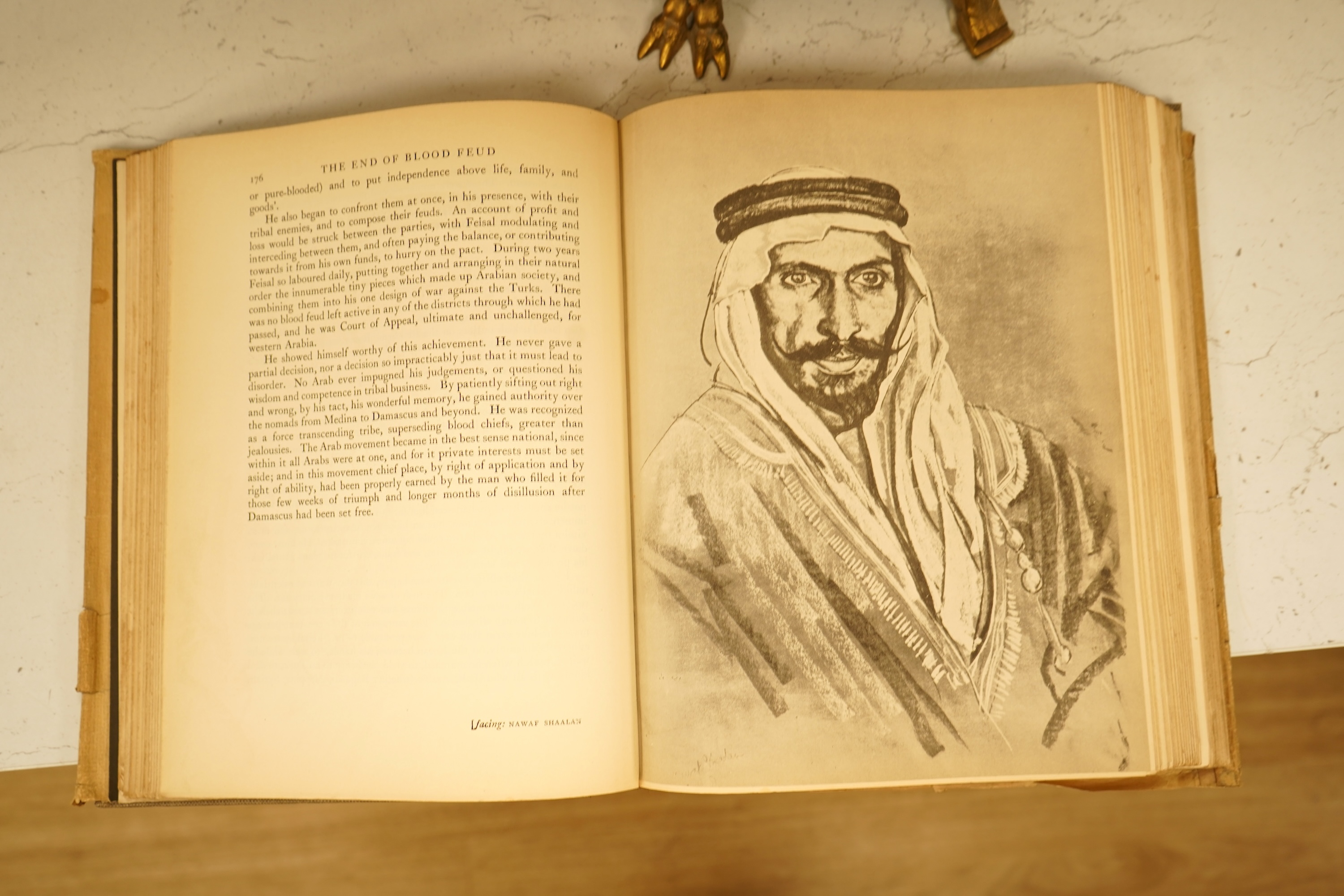 Lawrence, T.E. - Seven Pillars of Wisdom: a triumph. 1st US. trade edition. num. plates (many are portraits by Kennington and others), 6 text illus. and 4 maps (outline colour); publisher's gilt cloth and d/wrapper, roy.